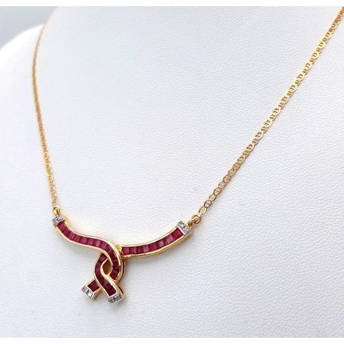 2 - A very elegant 14 K yellow gold chain necklace with a central part loaded with rubies and diamonds i... 