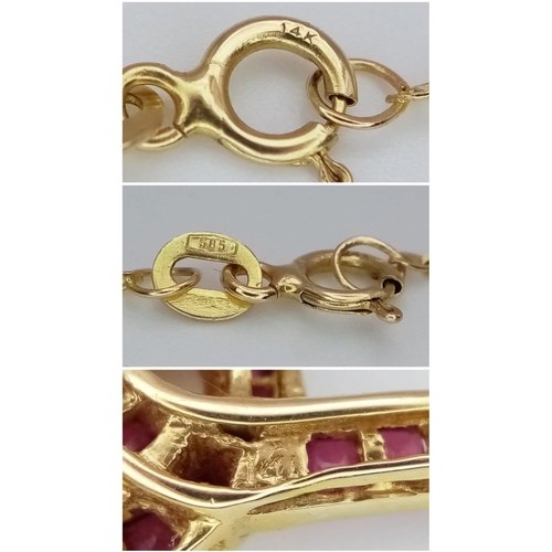 2 - A very elegant 14 K yellow gold chain necklace with a central part loaded with rubies and diamonds i... 