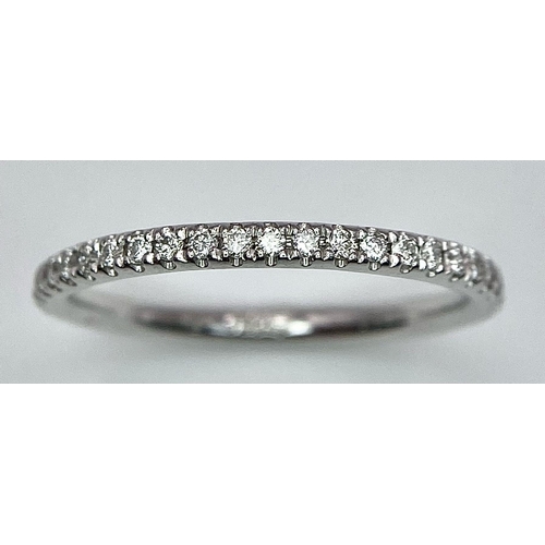 220 - An 18K White Gold Diamond Half Eternity Ring. Size M. 1.55g total weight.