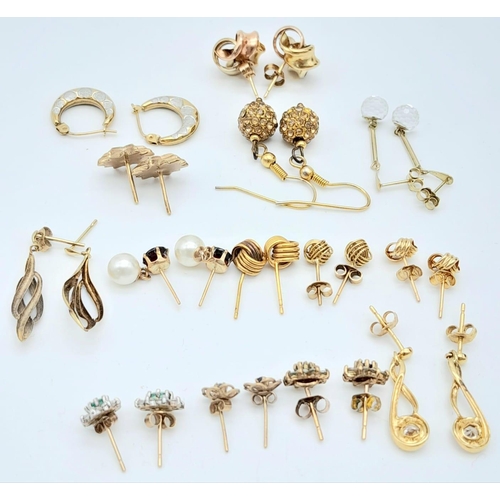 389 - A spectacular collection of fourteen pairs of 9 K yellow gold earrings, some with precious stones an... 