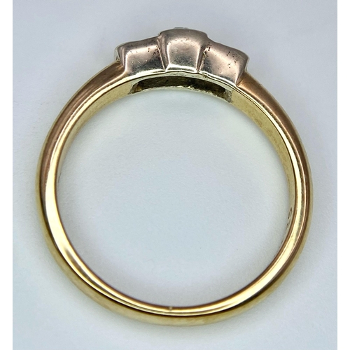 452 - A 9K YELLOW GOLD TRILOGY DIAMOND RING. 0.30CT. 2.8G SIZE M