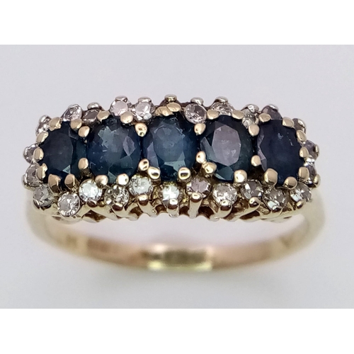 466 - A 9K YELLOW GOLD DIAMOND & SAPPHIRE RING. 2.7G. SIZE M.