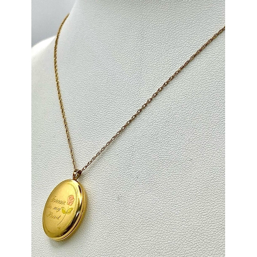 486 - A 9 K yellow gold chain necklace with a locket carrying the inscription 