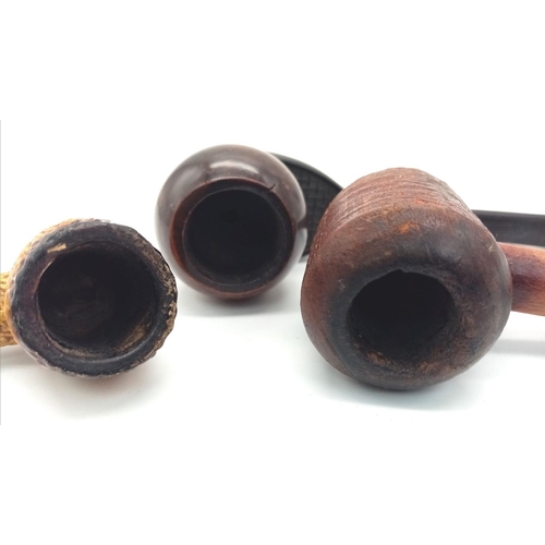 731 - Three old pipes. Including one in the form of a Tennis racket.