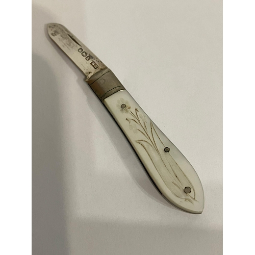 735 - Antique SILVER BLADED FRUIT KNIFE . Having mother of pearl handle with floral engraving. Purse size.... 