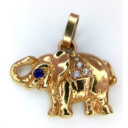 795 - A 9K YELLOW GOLD STONE SET ELEPHANT CHARM. 2.4G