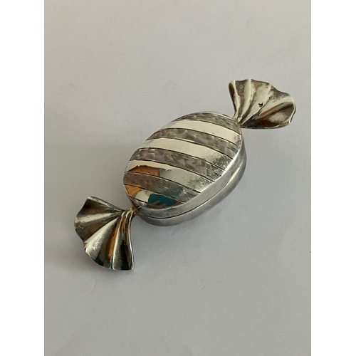 806 - Vintage SILVER PILL BOX in the unusual form of a Wrapped Toffee. Full UK hallmark.