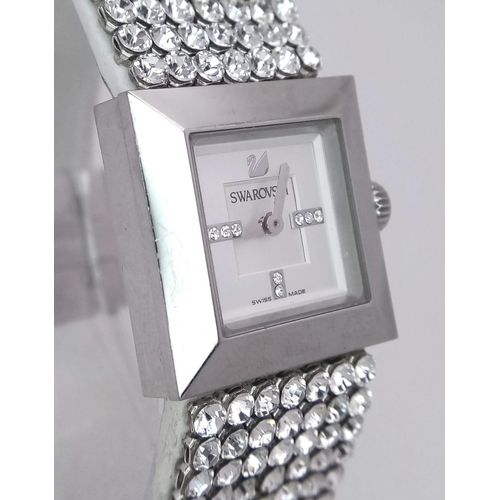 935 - A Swarovski White Crystal Decorative Quartz Ladies Watch. Square case - 23mm width. White dial. In g... 