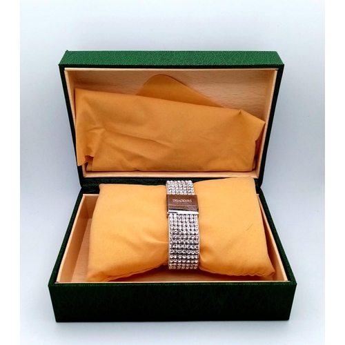 935 - A Swarovski White Crystal Decorative Quartz Ladies Watch. Square case - 23mm width. White dial. In g... 