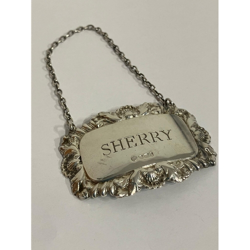 980 - Vintage SHERRY SILVER DECANTER LABEL. Fully hallmarked. Having attractive leaf and Shell borders. Ex... 