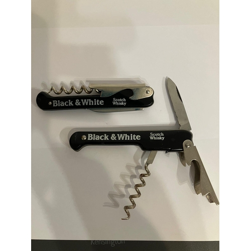 987 - 2 x Vintage ‘ Bar tenders friends’ Multi function knives. Complete with advertising logo for  Black ... 