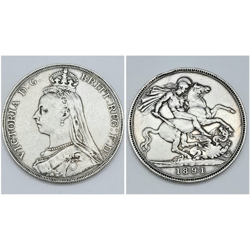 1081 - An 1891 Queen Victoria Silver Crown. VF grade but please see photos.