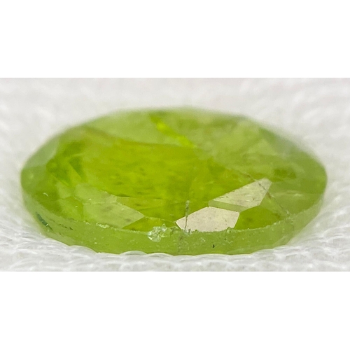 1087 - A sealed 5.11ct Burma Untreated Natural Peridot, in the Oval Faceted cut. Comes with the AIG certifi... 