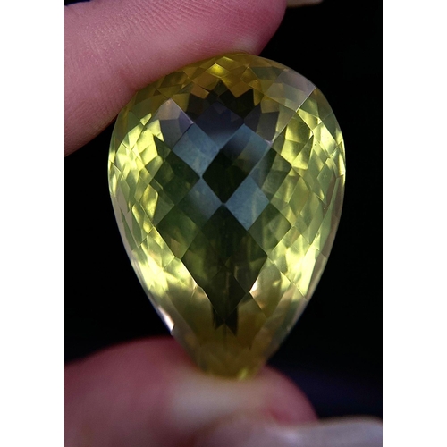 1108 - A 121.64ct Eye Clean Natural Lemon Quartz, in the Pear Checkerboard cut. Comes with the 121.64ct AIG... 