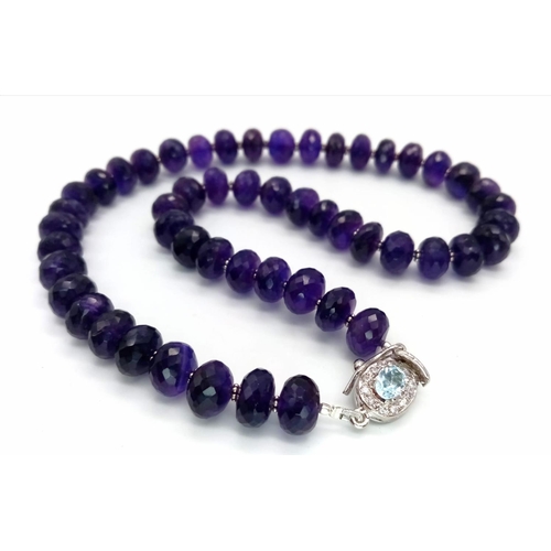 618 - A 380ctw Blue/Purple Sapphire Gemstone Necklace with Blue Topaz Clasp, 925 Silver. 46cm length. 75g ... 