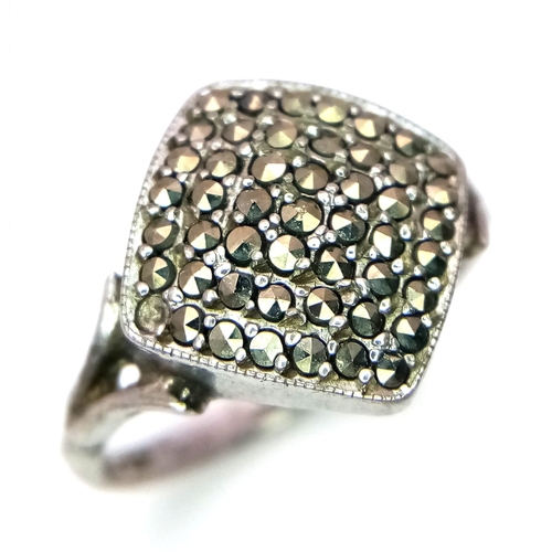 261 - A vintage silver stone set cluster ring. Total weight 2.8G. Size L.