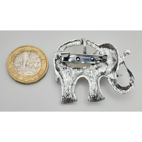 991 - An Opalite Elephant and Marcasite Spider Pendant. 5cm and 4cm