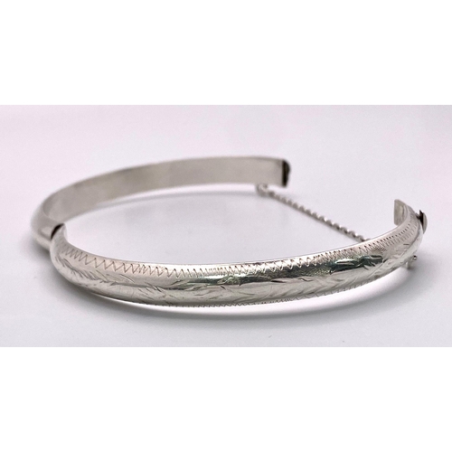 804 - 2X vintage sterling silver click-on bangles. One come with full Birmingham hallmarks. Total weight 2... 