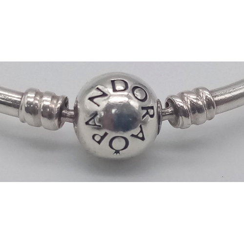 1167 - A 925 silver Pandora bangle. Total weight 8.4G. Diameter approx 6.5cm.