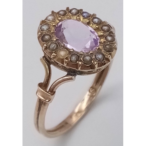 1083 - AN ANTIQUE AMETHYST AND SEED PEARL RING IN 9K GOLD.  2.1gms   size R