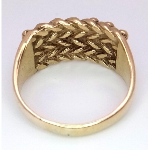 1274 - A 9K YELLOW GOLD 4 ROW KEEPER OR SHOT RING. 8G. SIZE S.