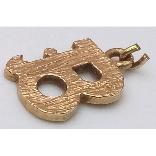 1355 - A 9K YELLOW GOLD INITIAL B CHARM. 0.8G