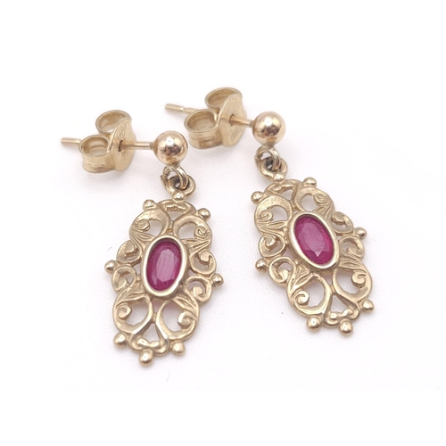 361 - Two antique pairs of 9 K yellow gold earrings, one with oval cut rubies the other one with marquise ... 