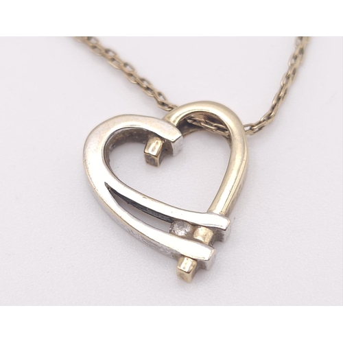 429 - A 9 L yellow gold chain necklace with a heart pendant decorated with a single diamond. Chain length:... 