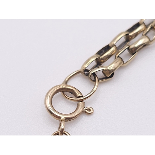 51 - A 9 K yellow gold double chain bracelet, length: 21 cm, weight: 3 g.