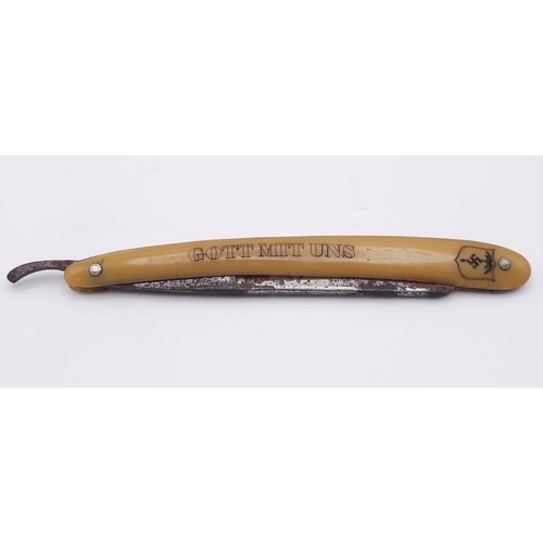 685 - WW2 German Africa Corps Patriotic Cutthroat Razor. There is s chip in the blade.