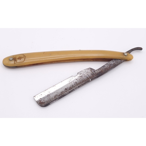 685 - WW2 German Africa Corps Patriotic Cutthroat Razor. There is s chip in the blade.