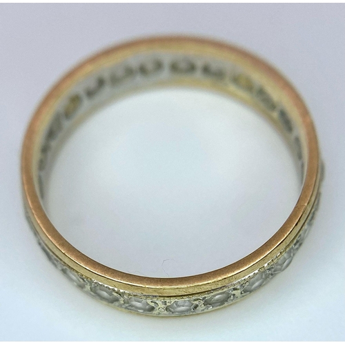 796 - A 9 K yellow gold, stone set, eternity ring. One stone missing. Size: O, weight: 2.7 g.