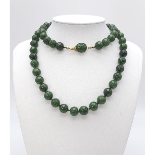 1131 - Long Green Jade Beaded Necklace.
Measuring 68cm in length, this necklace is filled with rich green r... 