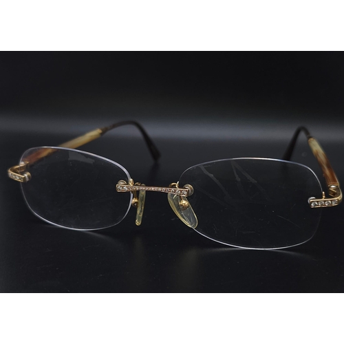 1065 - French made, magnifying glasses with 18kt Yellow Gold accents and set Diamonds. Come with a protecti... 