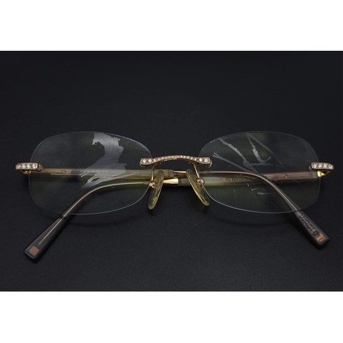 1065 - French made, magnifying glasses with 18kt Yellow Gold accents and set Diamonds. Come with a protecti... 