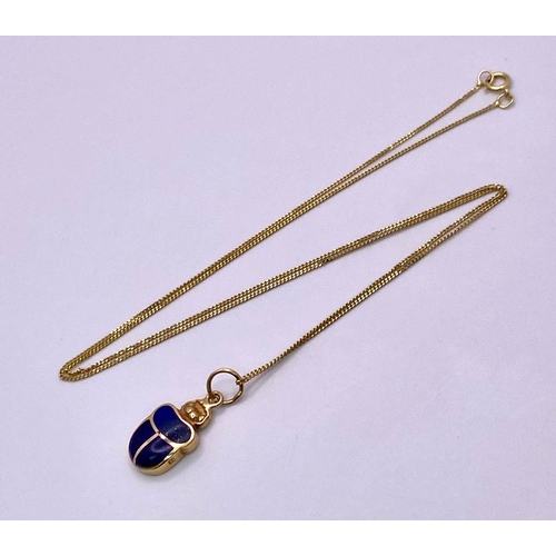 270 - A 9KT Yellow Gold Necklace with an Egyptian Hallmarked 9KT Gold Scarab Pendant. Scarabs are universa... 