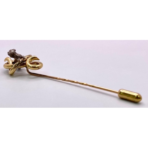 1020 - An Antique Mid-Carat Gold Hat Pin with cute little creature accent.
Measuring 9cm in length and weig... 