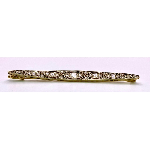 1051 - Stunning Antique 18kt Yellow Gold Diamond encrusted Bar Brooch.
Measuring a whooping 8cm wide, this ... 