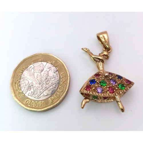 1136 - A 9kt Yellow Gold Jewelled Dancing Ballerina Charm/Pendant.
Measures 3cm in length.
Weight: 5.06g