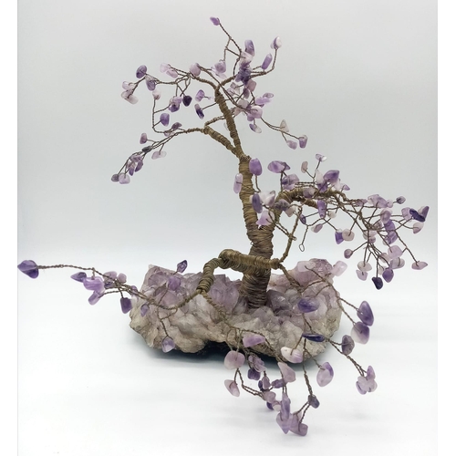 1073 - AN AMETHYST TREE OF LIFE 24cms IN HEIGHT