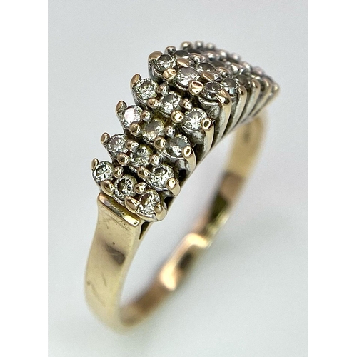 1076 - A 9K YELLOW GOLD 3 ROW DIAMOND RING. 0.50CT. 3G. SIZE O 1/2