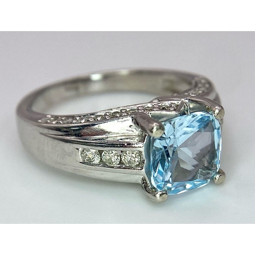 1116 - A FABULOUS AQUAMARINE AND DIAMOND RING SET IN 14K WHITE GOLD .   5.4gms   size M