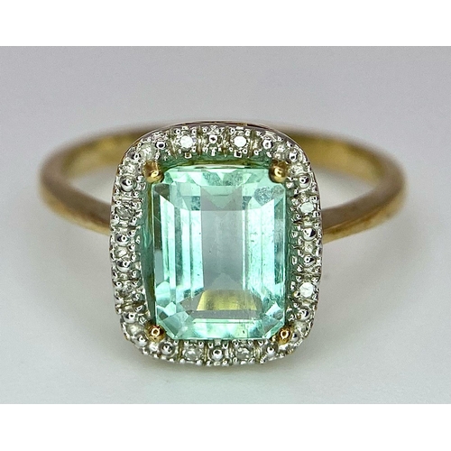 1117 - AN EXQUISITE GREEN AQUAMARINE WITH NATURAL BETHLEHEM DIAMONDS SET IN 9K GOLD .  2.3gms   size N/O