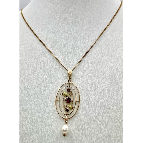 1197 - AN EDWARDIAN 9K GOLD PENDANT WITH GARNETS AND PEARLS ON A 44cms 9k GOLD CHAIN .  3.5gms