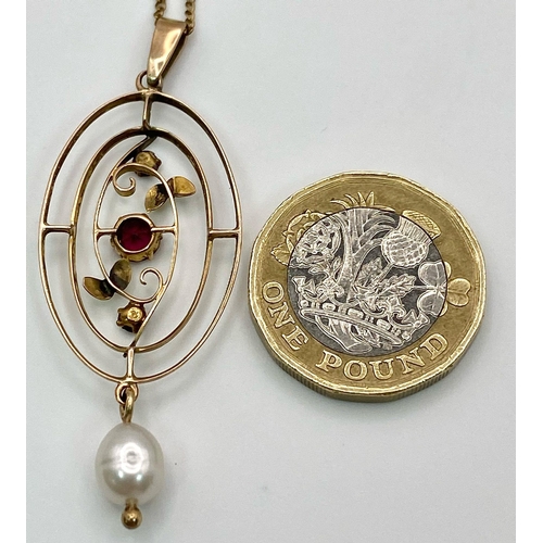 1197 - AN EDWARDIAN 9K GOLD PENDANT WITH GARNETS AND PEARLS ON A 44cms 9k GOLD CHAIN .  3.5gms