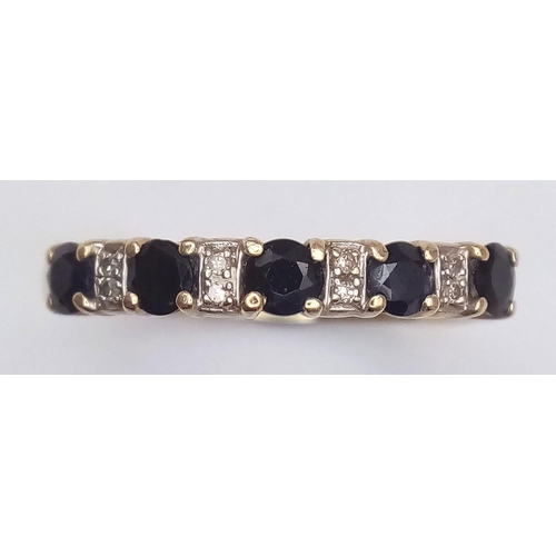 1222 - A 9K YELLOW GOLD DIAMOND & SAPPHIRE RING. 2.1G. SIZE O.