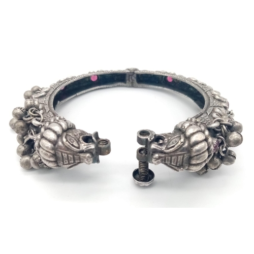 1230 - A White Metal Decorative Screw-Clasp Bangle with Double Dragon Heads.