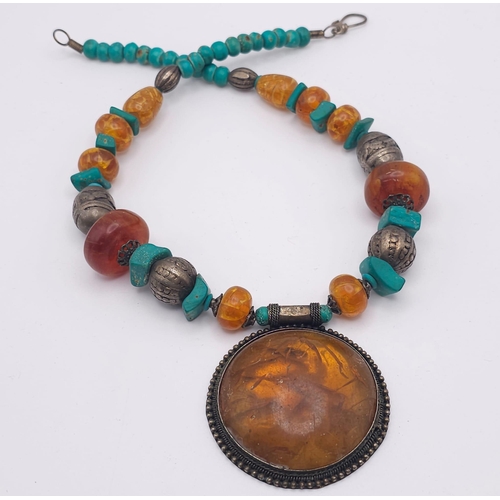 1236 - A Tribal Resin Amber Necklace with Cuff Bangle. Necklace - 46cm