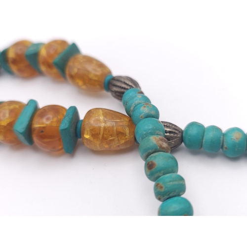 1236 - A Tribal Resin Amber Necklace with Cuff Bangle. Necklace - 46cm