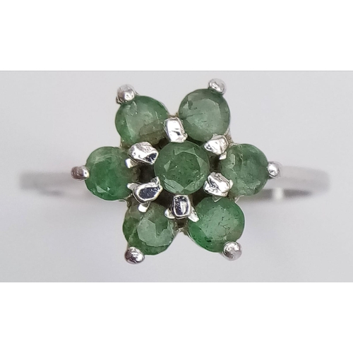 1244 - A 925 Silver and Emerald Ring. Size M.